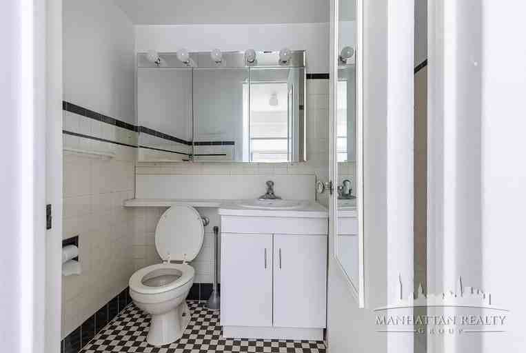 E 38th St #400 - Photo 2 of 3