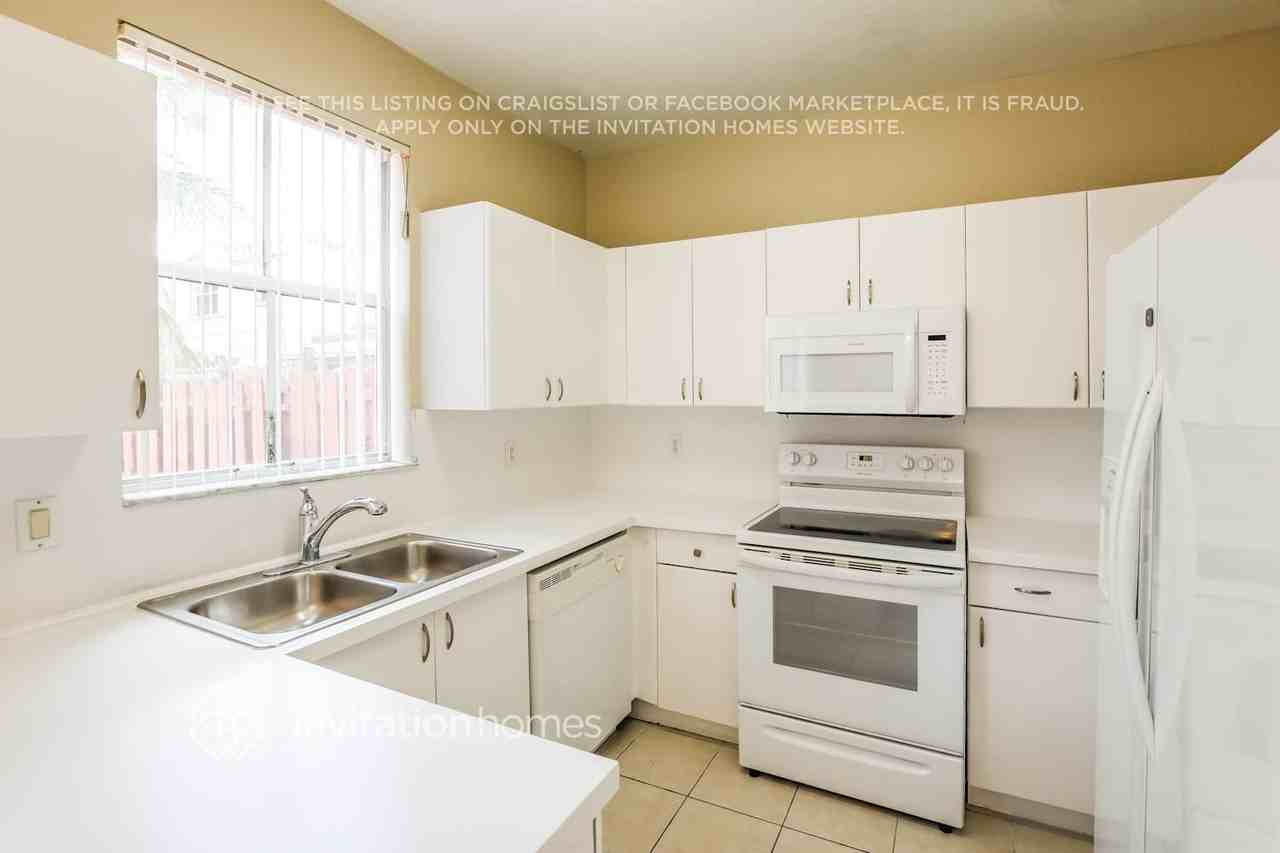 12513 Southwest 124th Court - Photo 7 of 18