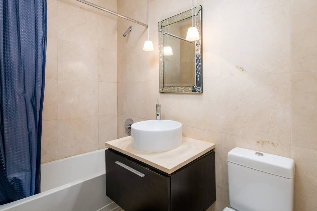 Wall St #1402 - Photo 4 of 6