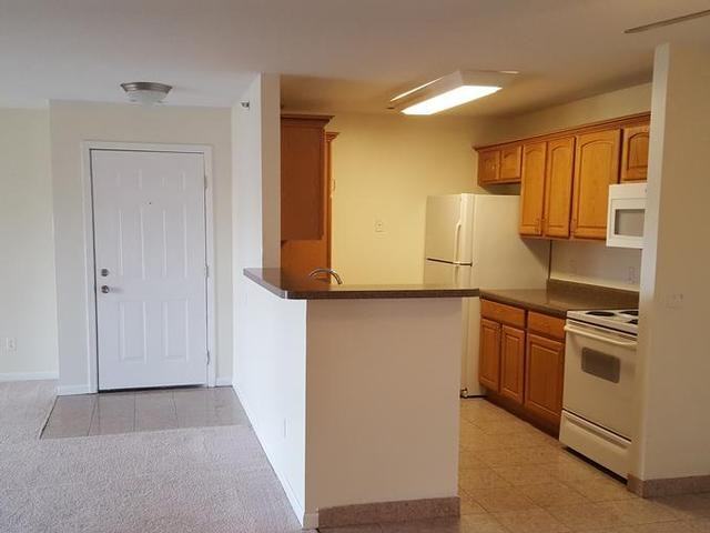 1147 W Grand River Ave - Photo 6 of 10