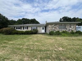 featured image of 8936 Huron River Dr