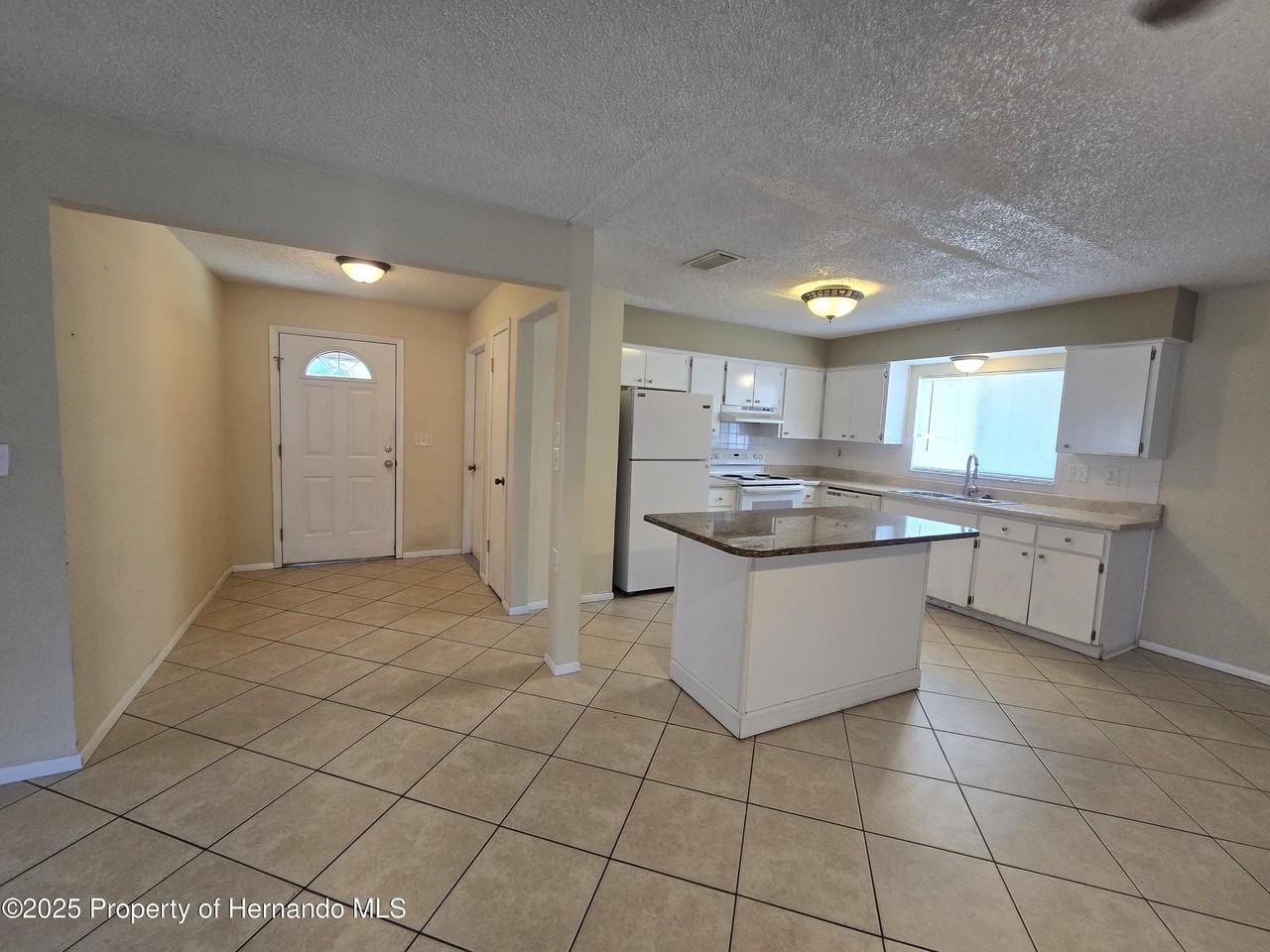 8915 Woodmill Dr - Photo 2 of 17