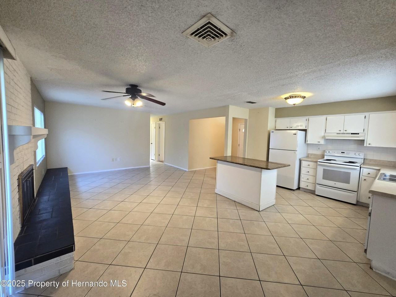 8915 Woodmill Dr - Photo 6 of 17