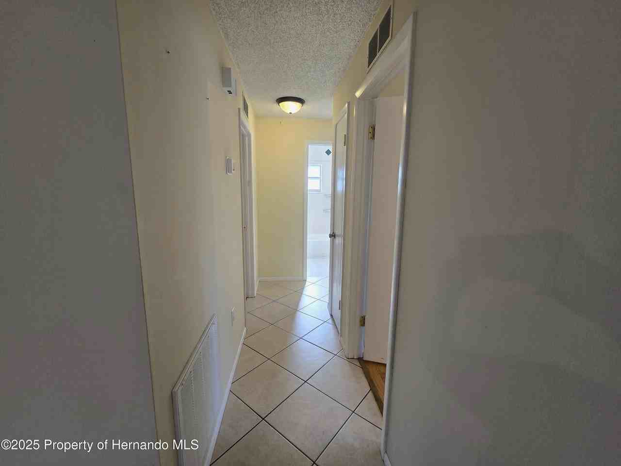 8915 Woodmill Dr - Photo 7 of 17