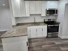 2551 Ne 7th Ter #2551A - Photo 1 of 1