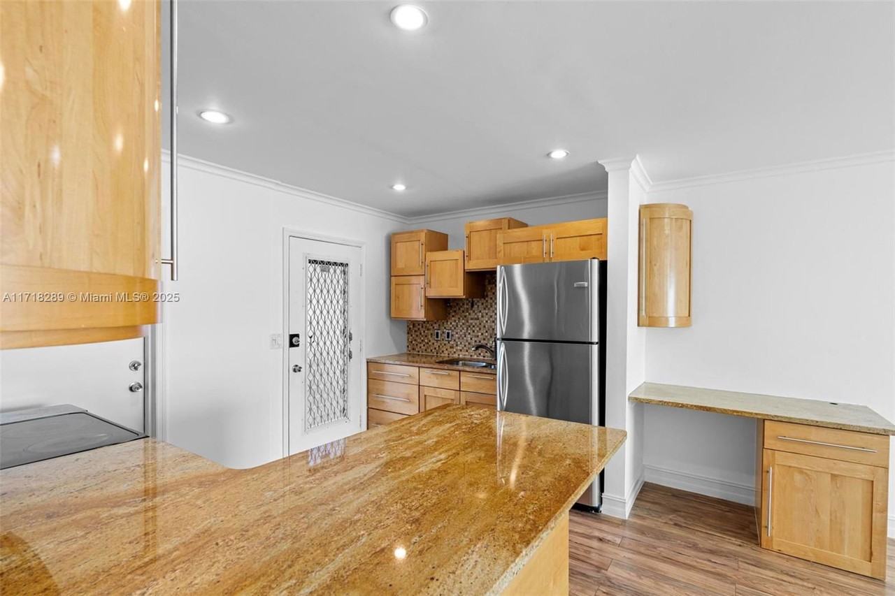 1250 E Sample Rd #208A - Photo 5 of 8