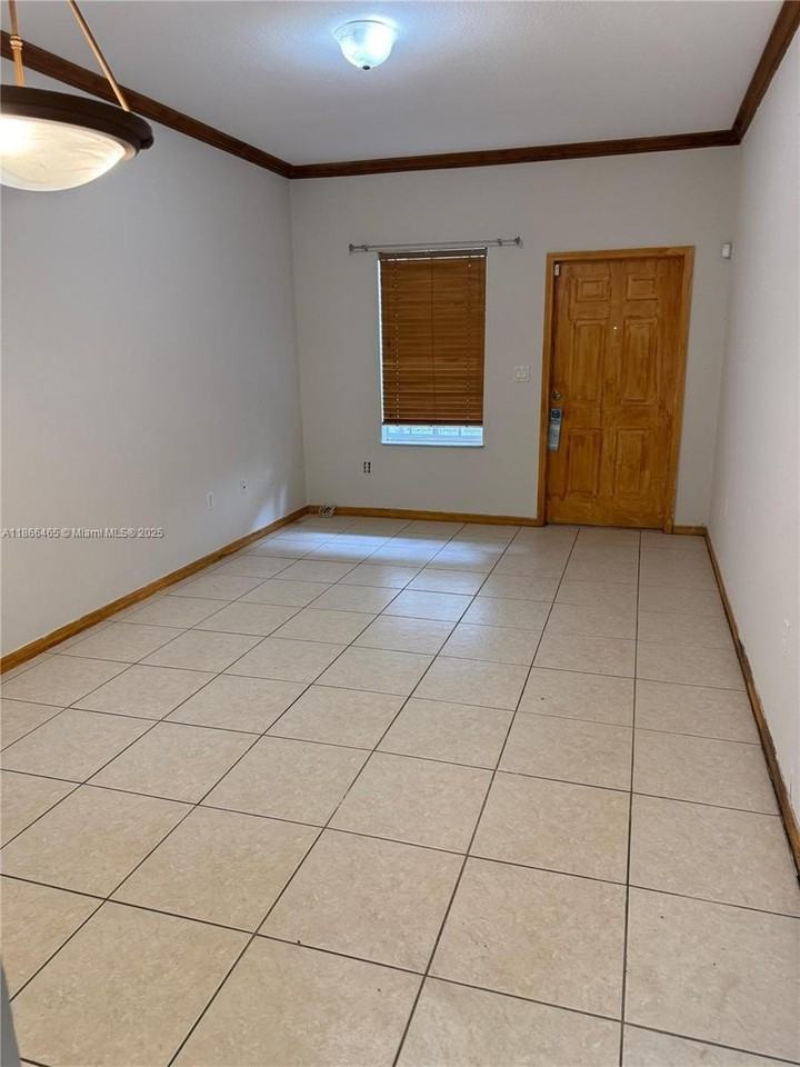 6922 Nw 179th St #103-5 - Photo 5 of 14