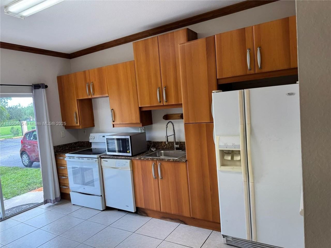 6922 Nw 179th St #103-5 - Photo 2 of 14