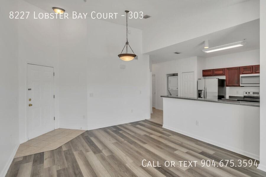 8227 Lobster Bay Ct #303 - Photo 5 of 20