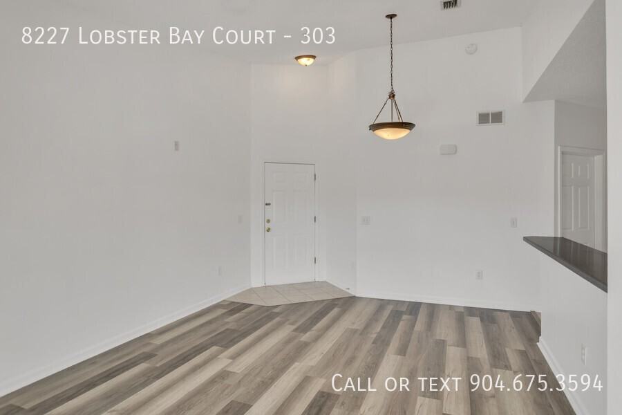 8227 Lobster Bay Ct #303 - Photo 6 of 20