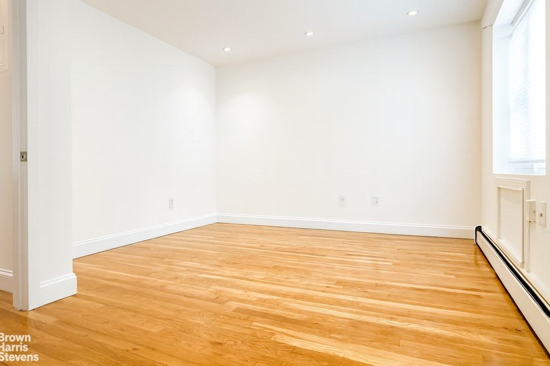 1079 Seneca Ave #1 - Photo 2 of 7