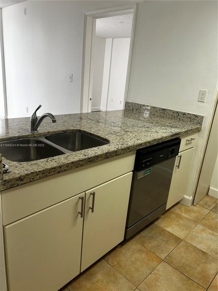 6955 Nw 186th St #F401 - Photo 4 of 15