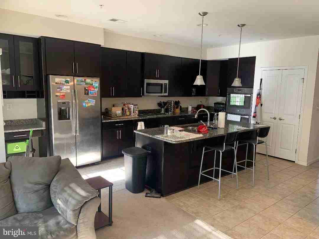 8115 Greenbelt Station Pkwy #302H - Photo 2 of 6