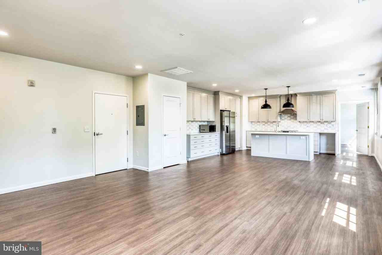 210 E Boscawen St Apt 202 #202 - Photo 2 of 32