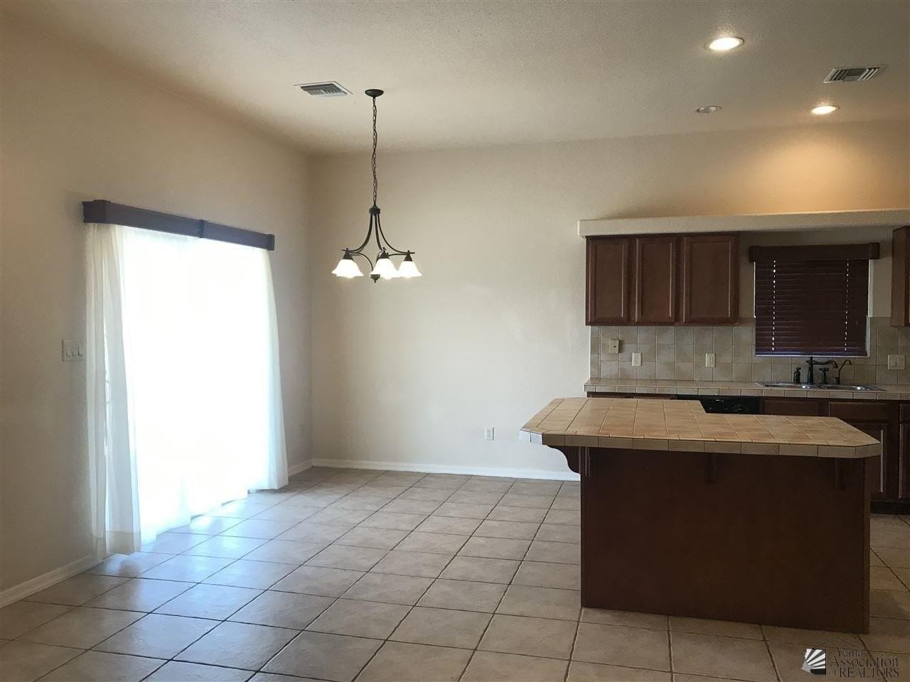 11610 E 28th Pl - Photo 3 of 17