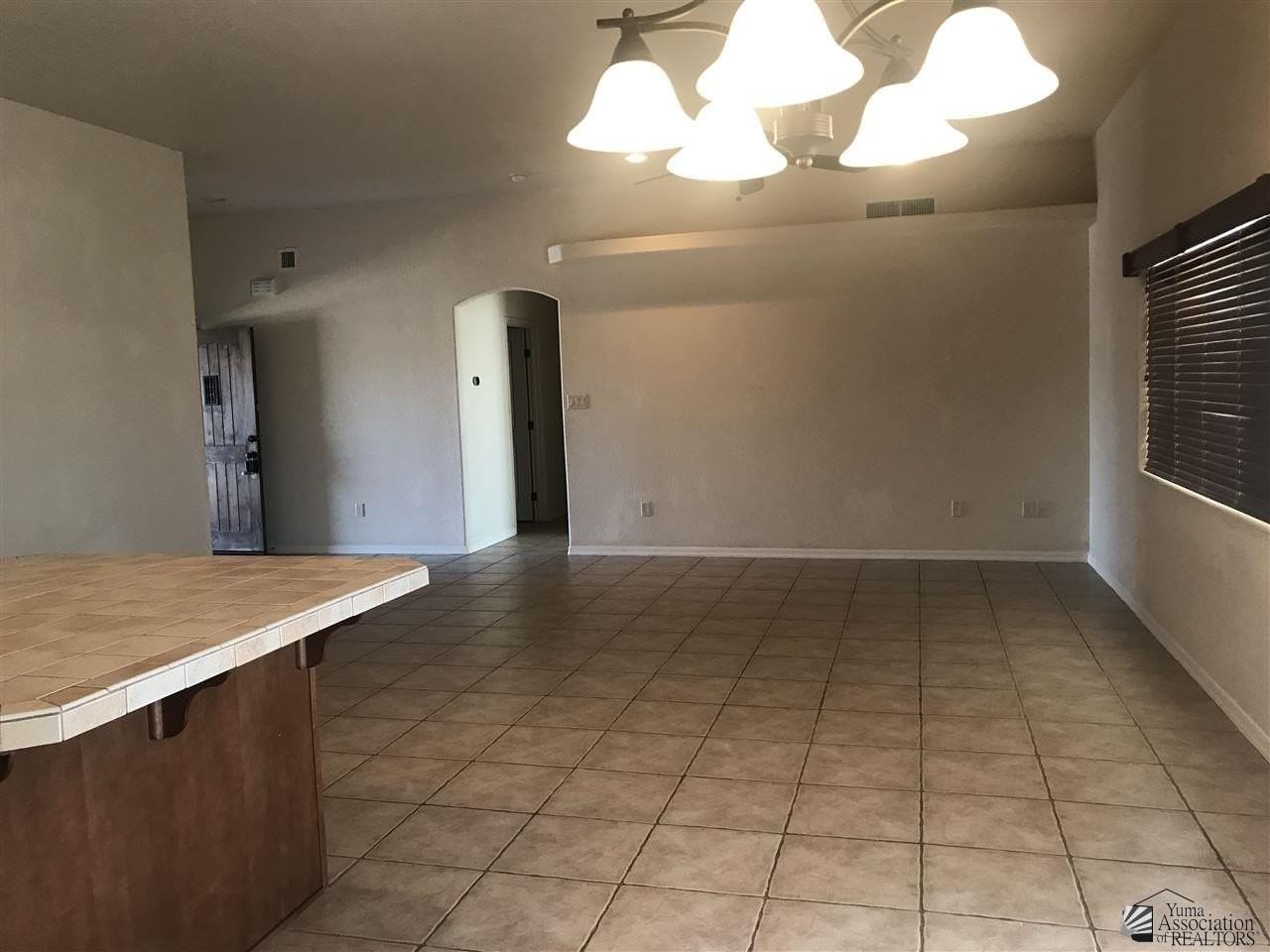 11610 E 28th Pl - Photo 4 of 17