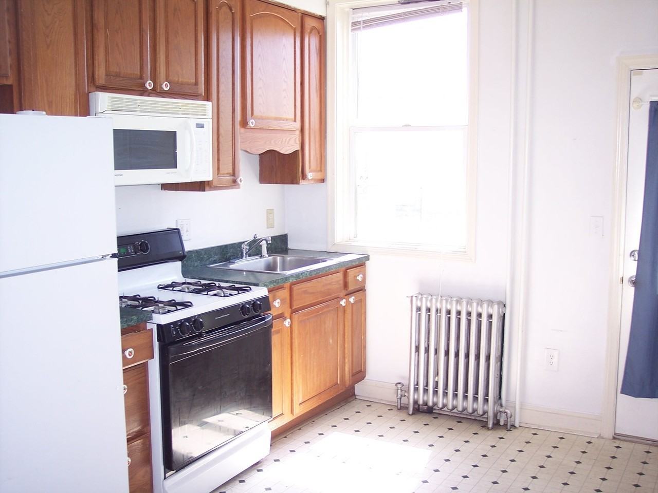 845 W 34th St - Photo 3 of 10