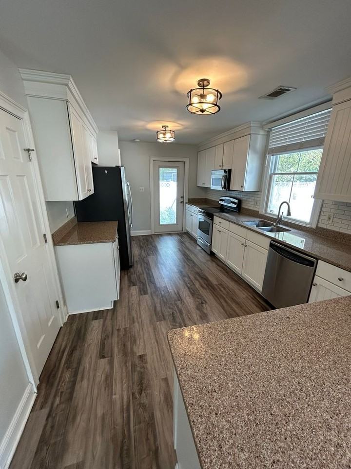 112 W 31st Ln - Photo 3 of 24