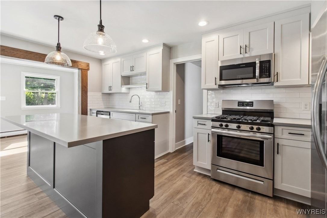 6450 Chestnut Ridge Rd - Photo 6 of 18