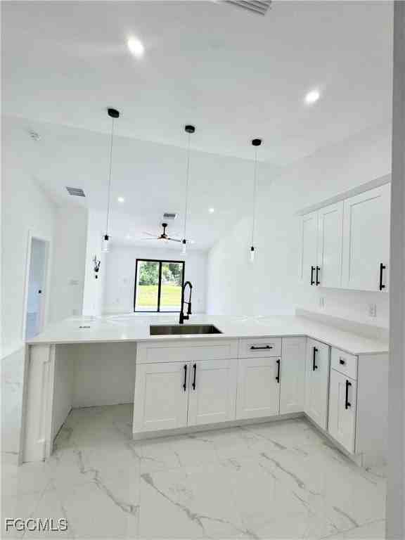 670 Chemstrand St E - Photo 5 of 34