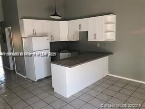 2242 Nw 55th Ter - Photo 3 of 5