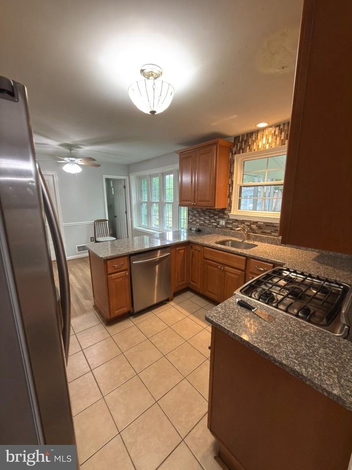 6919 Rolling Rd - Photo 3 of 20