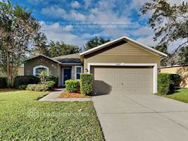 featured image of 5848 Windsong Oak Dr