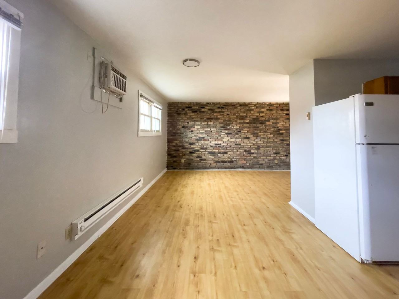 Spacious Apartments in the Heart of the Village - Photo 4 of 40