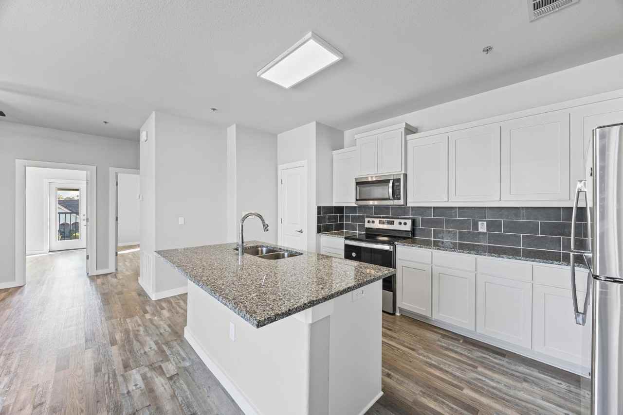 201 E 5th St - Photo 7 of 10