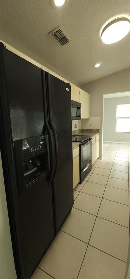 7515 Leon Ave - Photo 5 of 27