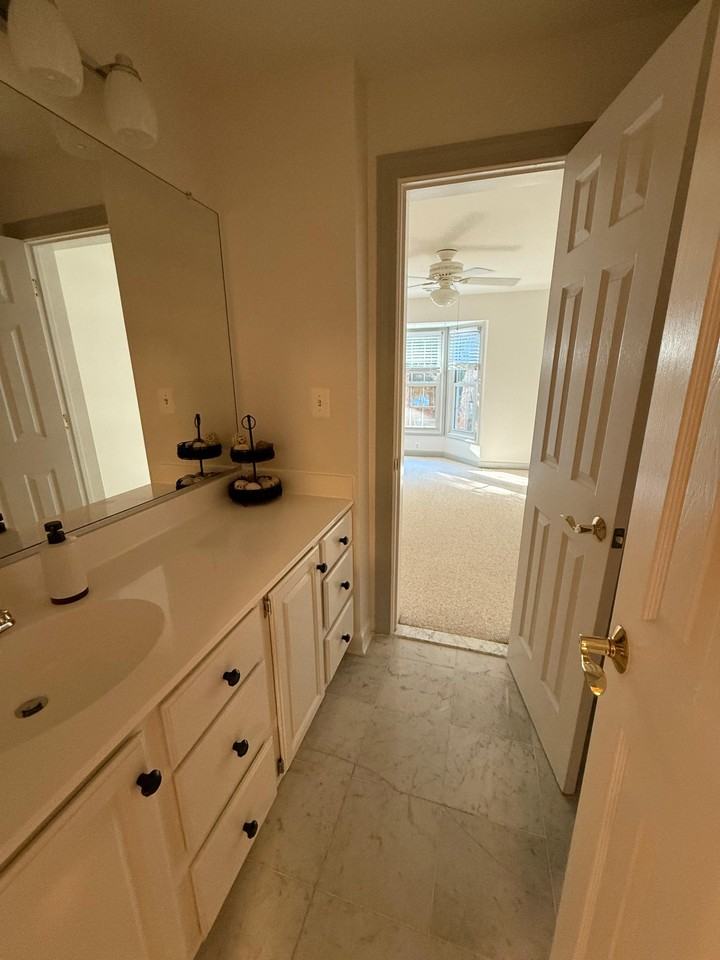 12221 Fairfield House Dr #105B - Photo 3 of 25