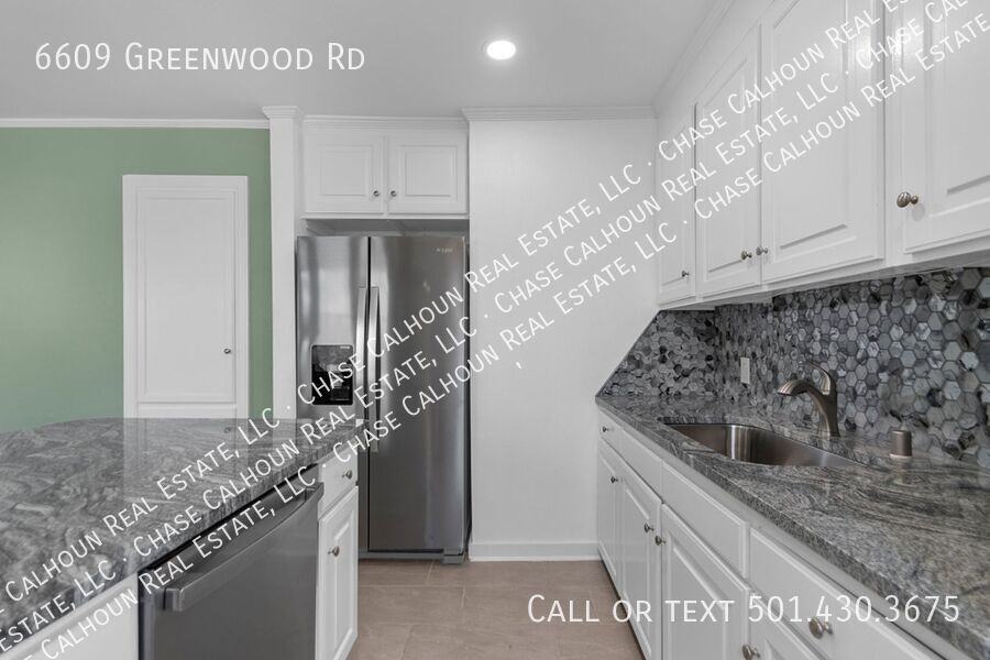 6609 Greenwood Rd - Photo 3 of 38