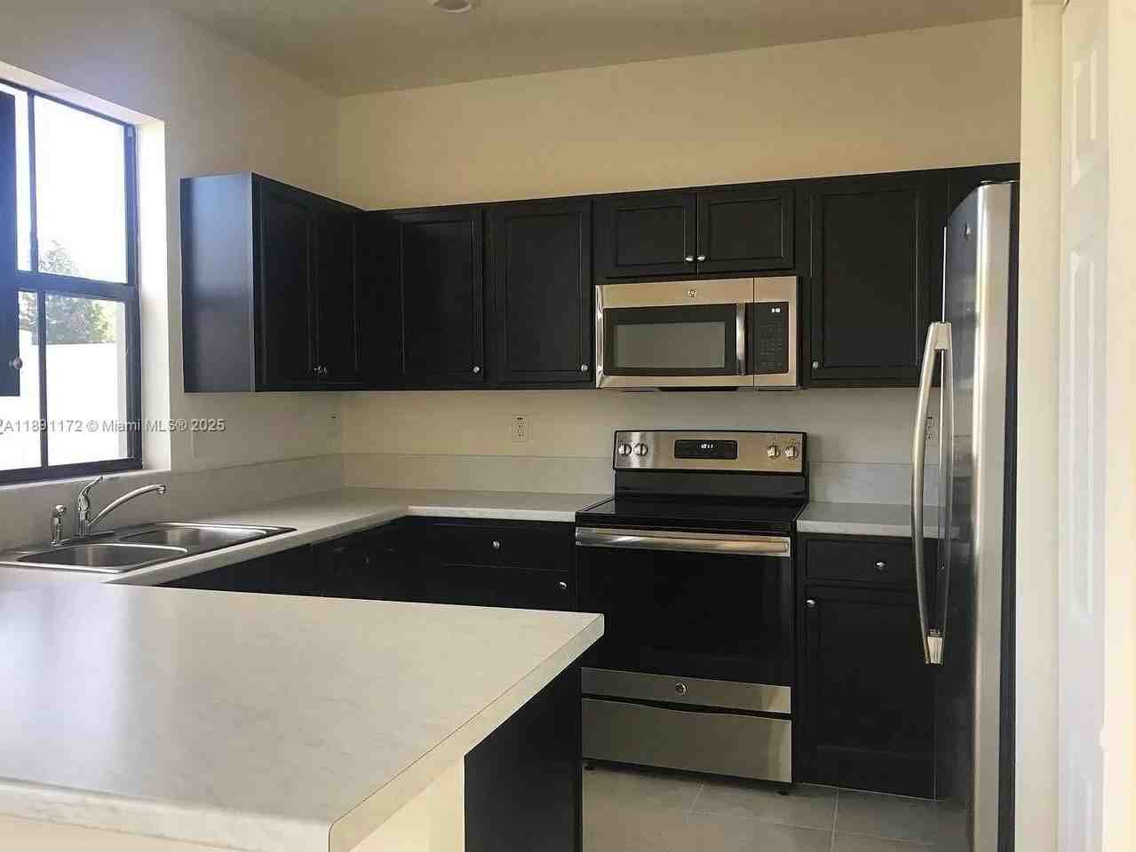 10401 W 32nd Ln - Photo 2 of 13