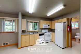 1421 W Bay Dr Nw - Photo 1 of 1