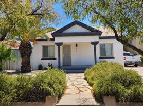 10th and Hughes ( 816 E. 10th St. & 815 E. Hughes St. ) - Photo 1 of 1