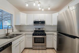 10th and Hughes ( 816 E. 10th St. & 815 E. Hughes St. ) - Photo 1 of 1