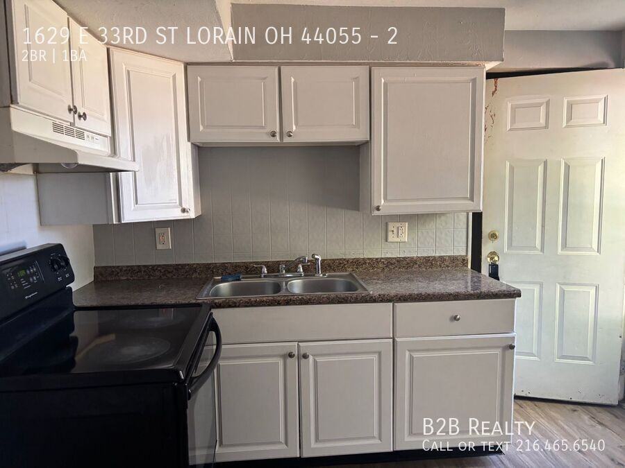 1629 1629 E 33RD ST LORAIN OH 44055 #2 - Photo 2 of 11