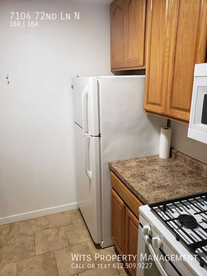 7104 72nd Ln N - Photo 3 of 9