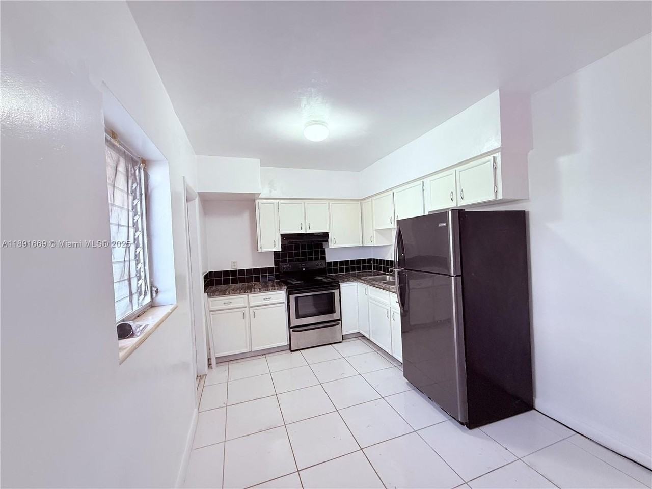 461 Ne 82nd Ter #4 - Photo 6 of 6