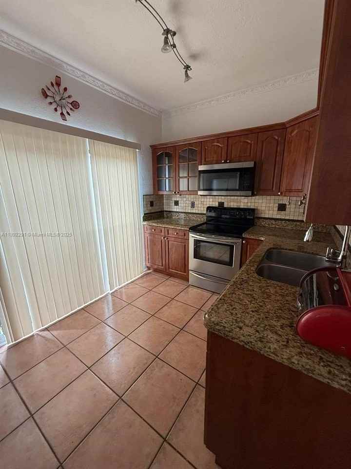 10450 Southwest 154th Court #3 - Photo 2 of 15