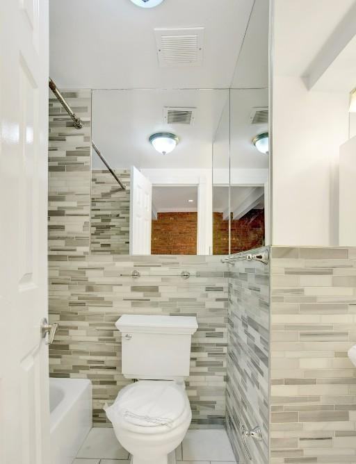 E 9th St #7 - Photo 6 of 7