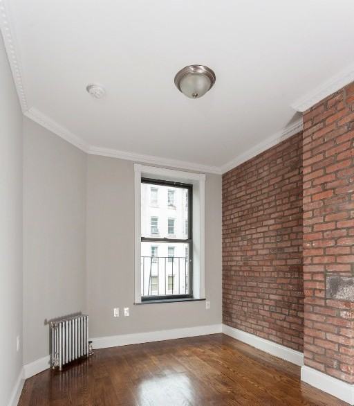 E 9th St #6 - Photo 5 of 8