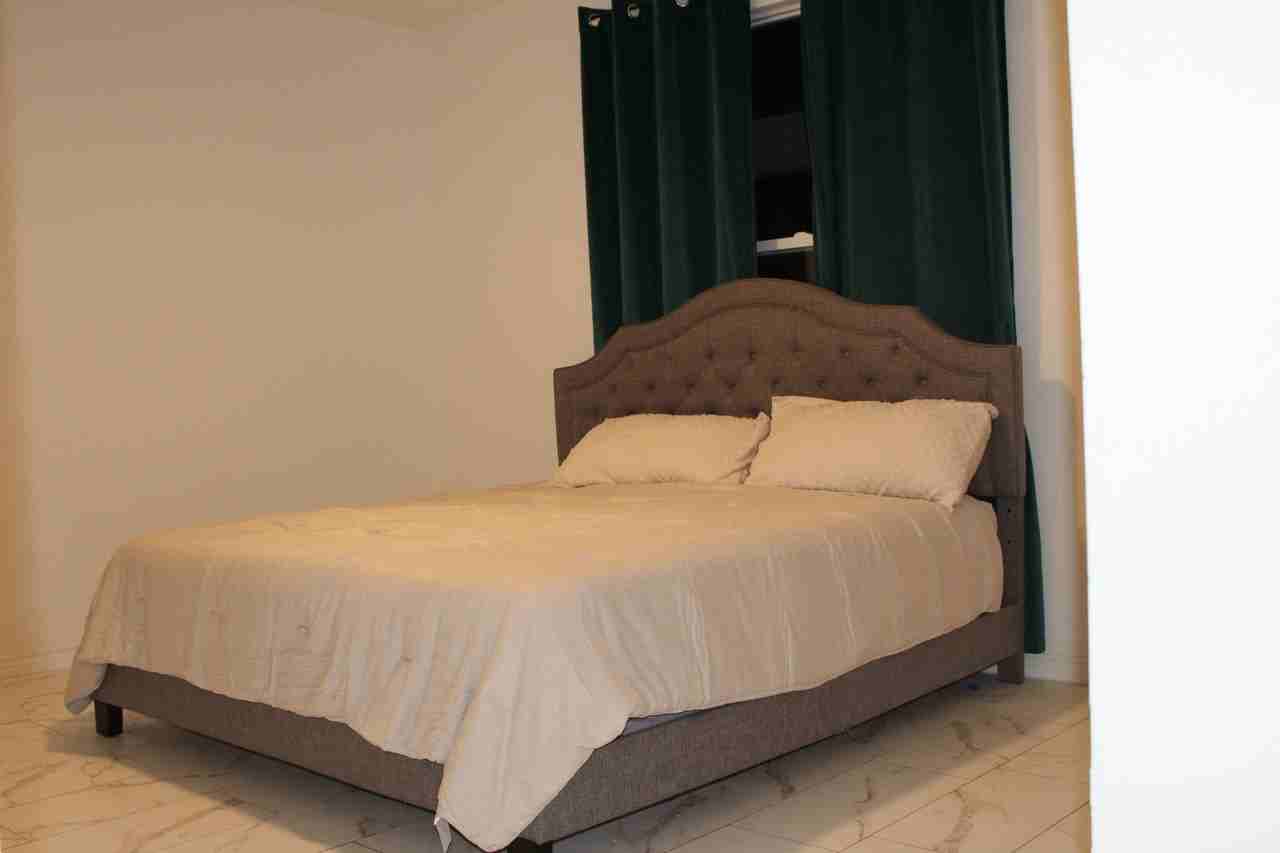 Claude St - Photo 3 of 3