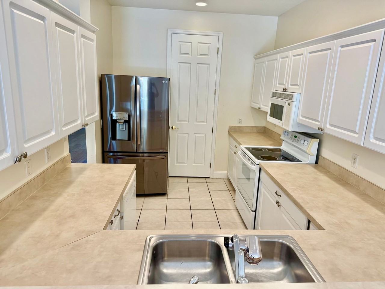 6825 S Kissimmee St - Photo 2 of 16