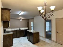 featured image of 6913 Jack Finney Blvd #1