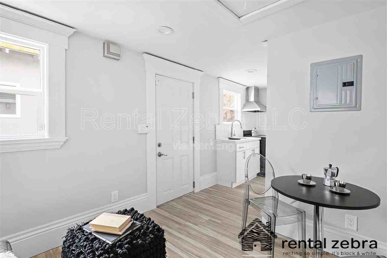 1823 1/2 Delaware St - Photo 2 of 11