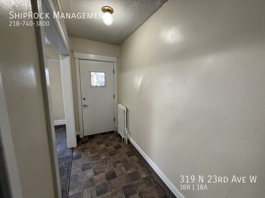 319 N 23rd Ave W - Photo 2 of 19