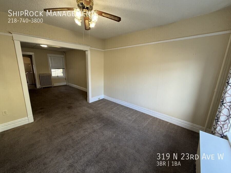 319 N 23rd Ave W - Photo 4 of 19