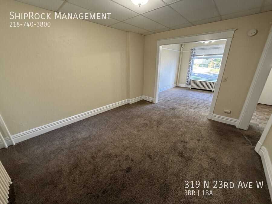 319 N 23rd Ave W - Photo 6 of 19