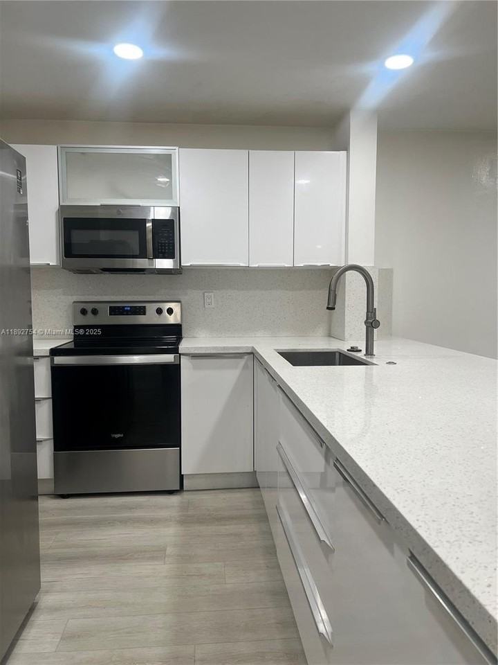 9621 Sw 77th Ave #108B - Photo 2 of 16